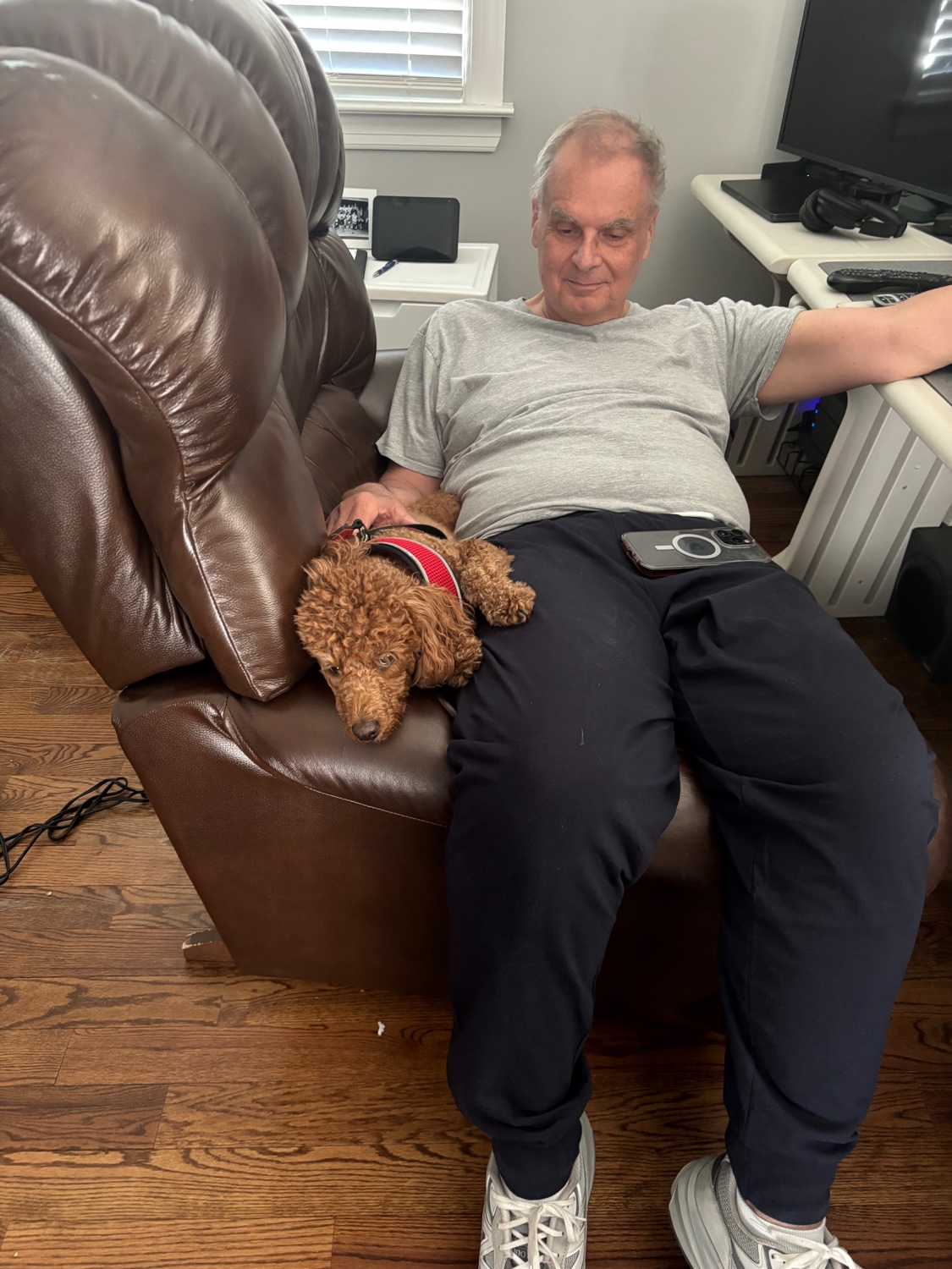 William resting at home with his dog in his final year