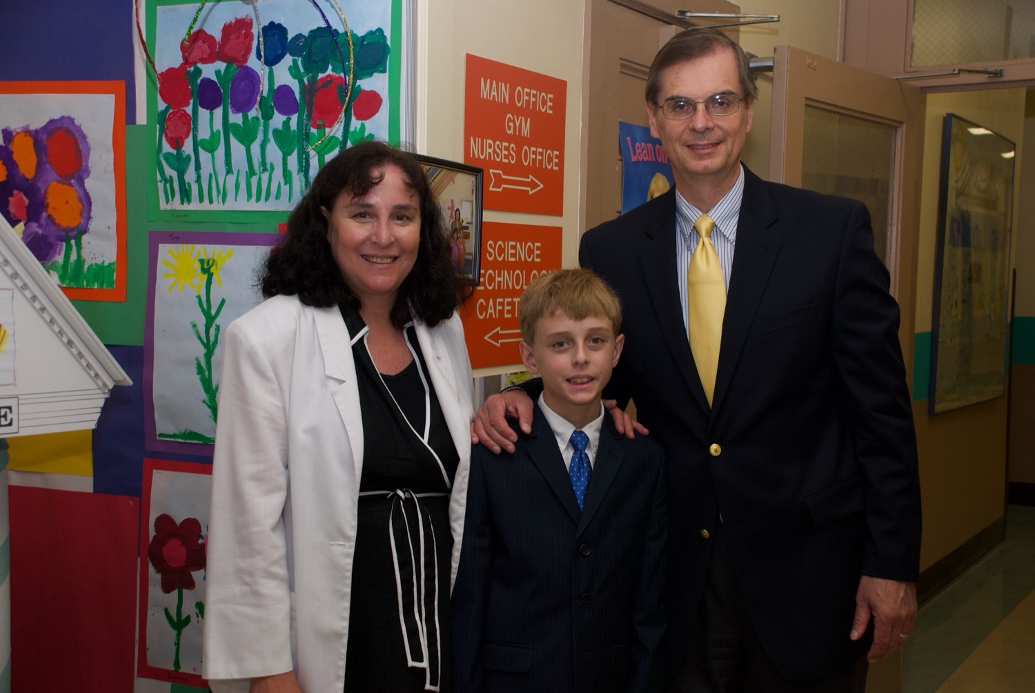 William, Adele, and Billy at a school ceremony