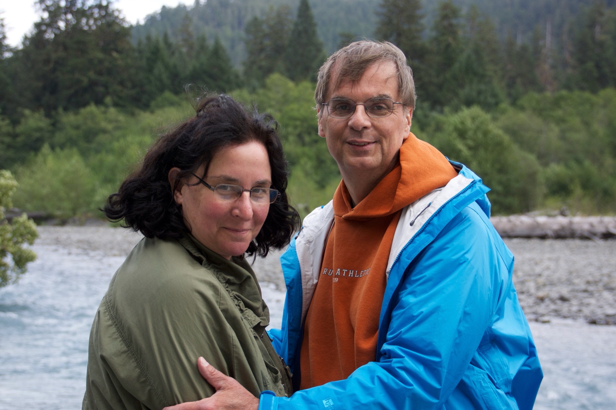 William and Adele on the West Coast by a rainforest river